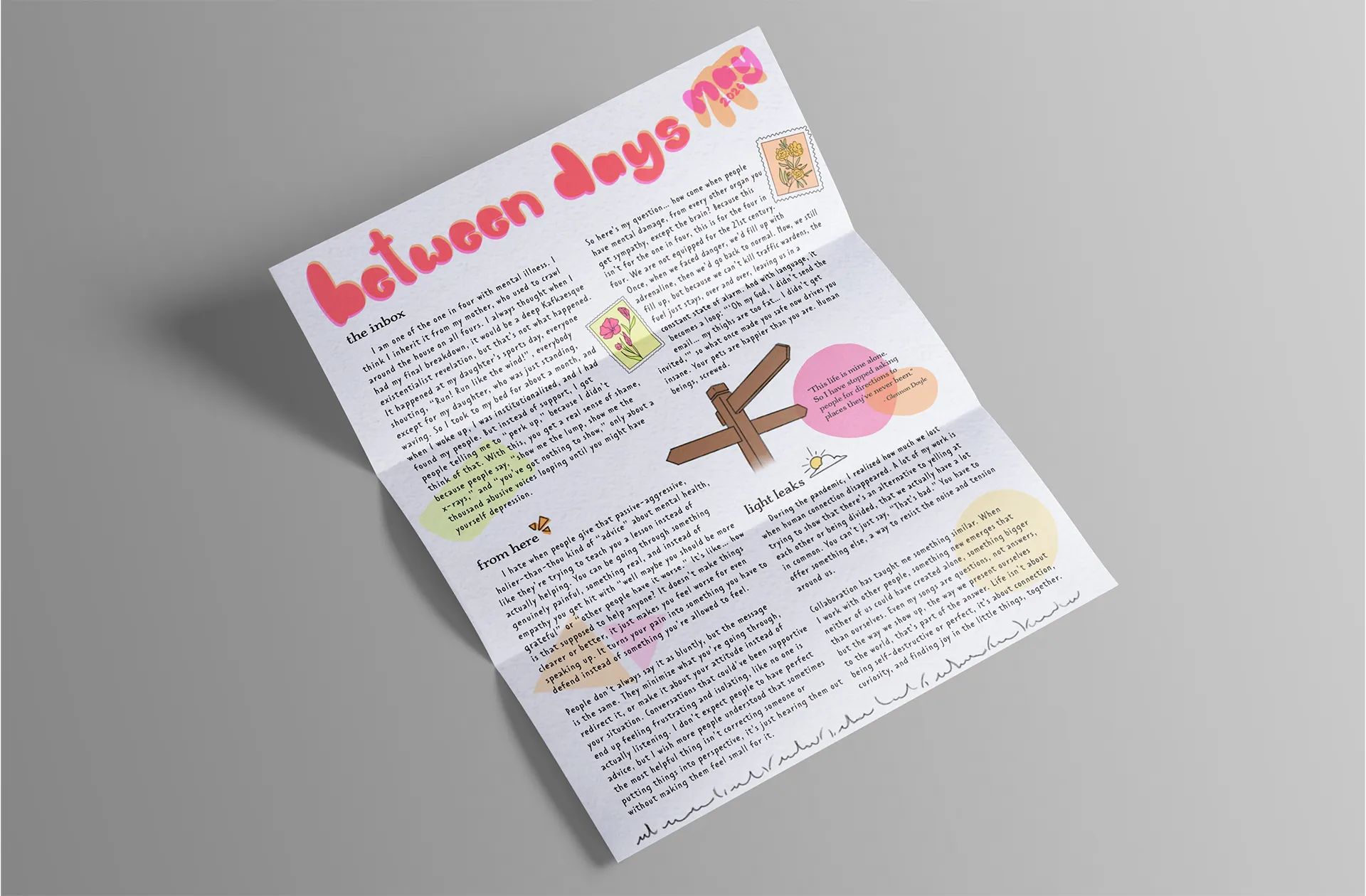 Angled page layout with the title “between days May” in bold bubble lettering, featuring columns of text, small illustrations, and pastel highlights on a textured paper background.